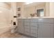Clean bathroom featuring a bathtub with shower, vanity and white cabinets at 3547 Planck Cir, Danville, IN 46122