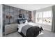 Stylish bedroom designed with unique accent wall and industrial-chic furnishings at 3547 Planck Cir, Danville, IN 46122
