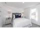 Serene bedroom with a comfortable bed, mirrored nightstands, and ample natural light at 3547 Planck Cir, Danville, IN 46122