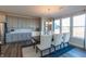 Well-lit dining area with large windows, modern cabinets and seating for six at 3547 Planck Cir, Danville, IN 46122