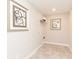 Clean and functional laundry room with neutral walls, tiled floor, and wall art at 3547 Planck Cir, Danville, IN 46122