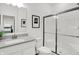 Bright and well-lit bathroom with glass enclosed shower, modern fixtures, and plenty of counter space at 3548 Planck Cir, Danville, IN 46122