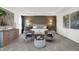 Luxurious main bedroom featuring neutral tones, accent wall, sitting area and two nightstands at 3548 Planck Cir, Danville, IN 46122