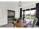 Elegant home office featuring natural light from a large window and French doors with views to the Entry at 3548 Planck Cir, Danville, IN 46122