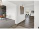 A bright, airy home office and dining room with stylish furnishings create an ideal space for work and meals at 3548 Planck Cir, Danville, IN 46122