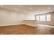 Unfinished basement featuring recessed lighting, wood flooring, and light, neutral paint at 3787 Cherwell Dr, Zionsville, IN 46077