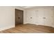 Bedroom featuring two large closets and a barn door leading into the room at 3787 Cherwell Dr, Zionsville, IN 46077