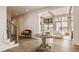 Open concept foyer with hardwood flooring leads to a living room bathed in natural light at 3787 Cherwell Dr, Zionsville, IN 46077