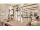 Bright kitchen with stainless steel faucet, sink, and an open layout to the living area at 3787 Cherwell Dr, Zionsville, IN 46077