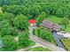 Sprawling country home on an expansive lot with mature trees and a detached garage at 4590 Turkey Track Rd, Martinsville, IN 46151