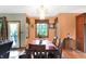 Inviting dining area with a chandelier and a view of the backyard at 4590 Turkey Track Rd, Martinsville, IN 46151