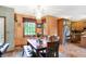 Charming dining room with a chandelier, natural light, and a view into the kitchen at 4590 Turkey Track Rd, Martinsville, IN 46151