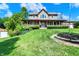 Charming two-story home with manicured lawn and covered front porch at 4590 Turkey Track Rd, Martinsville, IN 46151