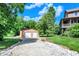 A detached two-car garage offering ample space and storage, with gravel driveway at 4590 Turkey Track Rd, Martinsville, IN 46151