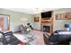 A well-lit living area featuring a fireplace and comfortable furniture at 4590 Turkey Track Rd, Martinsville, IN 46151