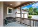 Inviting porch with wood flooring and bench, offering a relaxing outdoor space at 4590 Turkey Track Rd, Martinsville, IN 46151