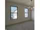Bright bedroom features a neutral color palette, and large windows offering ample natural light at 477 Mariposa Trl, Carmel, IN 46032