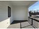 Covered patio featuring durable decking material, and views to the outdoors at 477 Mariposa Trl, Carmel, IN 46032