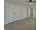 Large closet complements this bedroom that boasts carpet and a ceiling fan at 649 Washington St, Fortville, IN 46040
