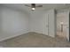 Bedroom boasts plush carpet, ceiling fan, and access to additional rooms at 649 Washington St, Fortville, IN 46040