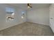 Bedroom showcasing natural light, carpet, and a ceiling fan for a comfortable space at 649 Washington St, Fortville, IN 46040