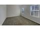 Bedroom features large windows and soft carpeting at 649 Washington St, Fortville, IN 46040