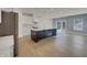 Modern kitchen features white cabinets, a center island, and stainless steel appliances at 649 Washington St, Fortville, IN 46040