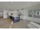 Modern kitchen with stainless steel appliances, a center island, and ample cabinet space at 649 Washington St, Fortville, IN 46040