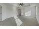 Spacious main bedroom features a tray ceiling with fan and ensuite access at 649 Washington St, Fortville, IN 46040