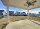 Covered patio overlooking a well-maintained backyard, perfect for outdoor seating at 649 Washington St, Fortville, IN 46040
