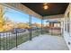 Spacious front porch with decorative railings, offering a pleasant outdoor seating area at 741 N Linwood Ave, Indianapolis, IN 46201