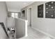 Upstairs hallway with a view of a desk space and domino wall art hanging on the wall at 7523 Fallsworth Dr, Avon, IN 46123