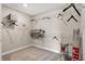 Walk-in closet featuring carpet, wire shelving, and storage solutions at 7523 Fallsworth Dr, Avon, IN 46123