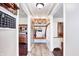 Inviting entryway boasting wood floors, storage, and convenient access to kitchen and living areas at 7816 E St Joseph St, Indianapolis, IN 46219