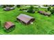 Aerial view of a sprawling property showcasing buildings and lush green space at 905 S Maple St, Fortville, IN 46040
