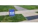 The Bridger Pines sign directs you to the Trail to Flat Fork Creek Park at 9709 Tampico Chase, Fishers, IN 46040