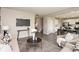 Open-concept living room with sofas, an adjacent dining area, and a modern kitchen at 9709 Tampico Chase, Fishers, IN 46040
