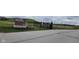 Entrance to Flat Fork Creek Park, with sign and gate at 9709 Tampico Chase, Fishers, IN 46040