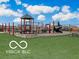 Community playground with swings, slides, and climbing structures at 9709 Tampico Chase, Fishers, IN 46040