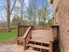 Wooden deck overlooking the backyard and landscaping at 10145 Northwind Dr, Indianapolis, IN 46256
