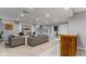Finished basement area with two sofas and a wet bar at 10145 Northwind Dr, Indianapolis, IN 46256