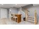 Finished basement area featuring a small bar area and staircase at 10145 Northwind Dr, Indianapolis, IN 46256