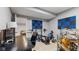 Basement room with workout area, drum set, and desk at 10145 Northwind Dr, Indianapolis, IN 46256