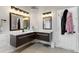 This bathroom features a floating vanity with double sinks at 10145 Northwind Dr, Indianapolis, IN 46256