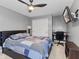 Comfortable bedroom featuring a ceiling fan, desk and TV at 10145 Northwind Dr, Indianapolis, IN 46256