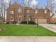 Beautiful brick two-story home with a well-manicured lawn and attached two car garage at 10145 Northwind Dr, Indianapolis, IN 46256