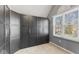 This walk-in closet provides lots of closet space and a sunlit window at 10145 Northwind Dr, Indianapolis, IN 46256