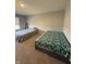 Spacious bedroom with two beds and illuminated blue lighting at 10950 N Heirloom Dr, Monrovia, IN 46157