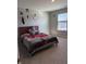 Sunlit bedroom with a comfortable bed, perfect for relaxation and rest at 10950 N Heirloom Dr, Monrovia, IN 46157