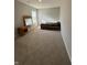 Bedroom with carpeted floor, natural lighting, and stylish furniture at 10950 N Heirloom Dr, Monrovia, IN 46157